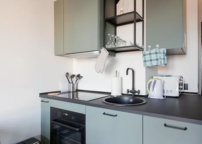 Guesthost - Renovated Apts Апартаменты *
